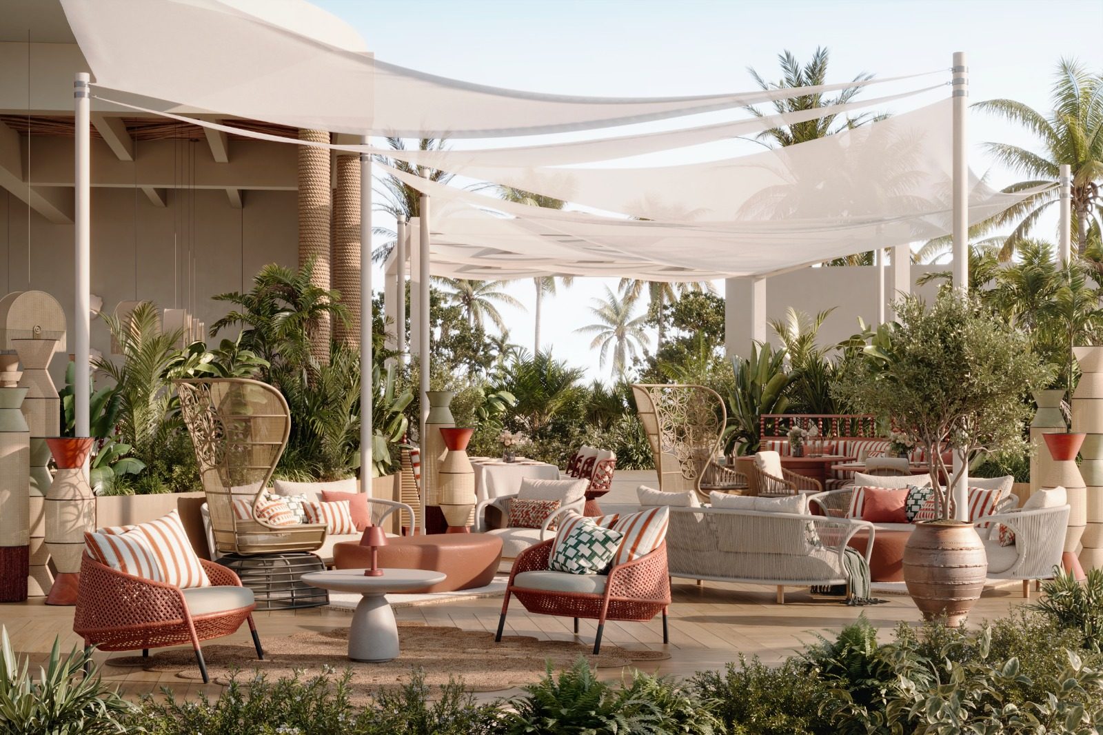 Lounge under white sail shades with striped cushions